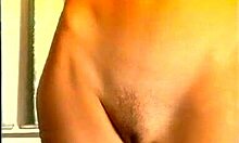 Horny naked slut sucking her boyfriends cock in POV