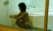 Yo, cute young Asian filmed taking a steamy shower in private bathroom