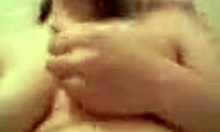 chubby brunette teen relaxes alone at home