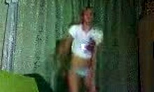 This petite blonde is dancing and teasing to the music