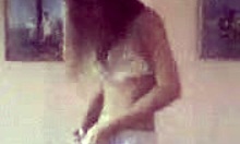 Petite young slut strips and dances on her bed