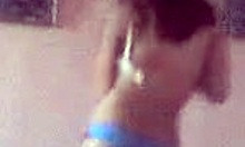 Petite young slut strips and dances on her bed