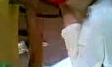 two guys spit roasting a brunette slut on the table?