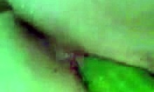 Cucumber Insertion Makes Her Moan with Extreme Pleasure