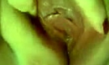 Aroused hottie relaxes at home with toys