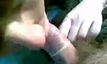 Hottie subtly flashes her big tits and sucks outdoors in this amateur clip.