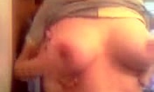 i'm aroused by this sweetie showing magnificent breasts on webcam. she's solo in private homemade scene