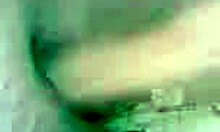 Aroused hottie relaxes at home with toys