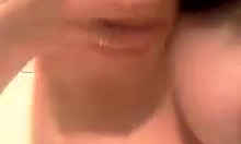 Aroused amateur babe adores playing with her big natural tits