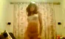 watch seductive russian brunette striptease shaved pussy natural tits