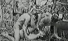 Sexy amateur sweetie engages in hot threesome action with natural tits and stockings.