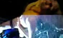 Irresistible stripper dances seductively, showing her ass in a thong at the night club