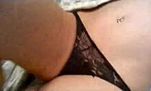 Teen girlfriend in black panties at home lying down