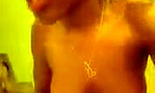 ebony amateur teases her shaved pussy solo on camera