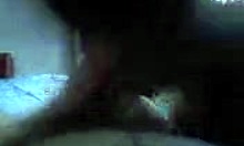 teenage brunette sucks boyfriend's cock in bedroom