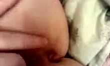 Russian amateur babe feels intense pleasure fingering her shaved cunt solo