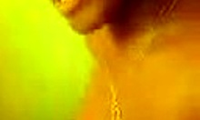 ebony amateur teases her shaved pussy solo on camera