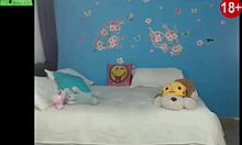 Teenager performs in front of webcam for the second time. She shows her enthusiasm.