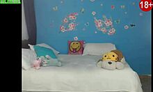 Teenager performs in front of webcam for the second time. She shows her enthusiasm.