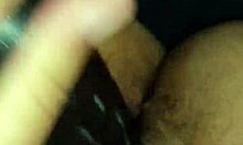 Wife playfully riding and playing with a large toy at home