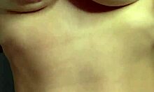 A hot student caresses her big natural tits