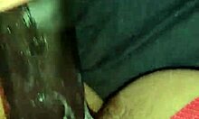 Wife playfully riding and playing with a large toy at home