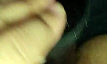 Wife playfully riding and playing with a large toy at home