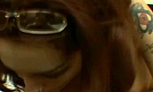 The horny babe with tattoos eagerly sucks his cock