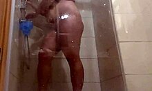 The Sexy Brunette Milf Plays With Her Big Tits In The Hotel Room