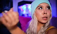 Blonde with a cute face gives her boyfriend a footjob, teasing his cock with her feet