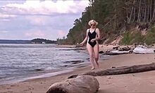 beautiful woman with big ass in costume charging at sea.