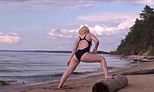 beautiful woman with big ass in costume charging at sea.