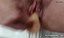 Hairy mature experiments with two toys in her pussy and squirts everywhere