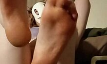 Feet in purple lace lingerie for fetish play