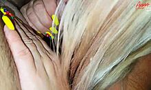 Blonde milf in panties performs leg exercise