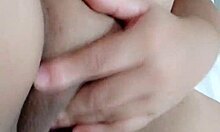 Cute amateur fingers dripping pussy in bedroom