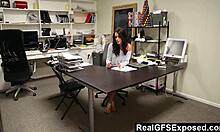 Horny secretary Whitney Westgate masturbates in the office, touching herself.