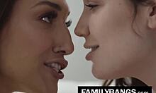 Bella teaches Lily the art of escorting on the sofa.