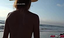 Want to see Sofie Marie tease her natural tits on the beach?