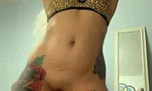 Look at this cute tattooed teen babe teasing in sexy lingerie!