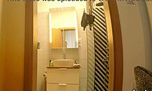 I am this hot tattooed girl preparing for a Leon Lambert scene in a see-through skirt without panties in the kitchen and bathroom.