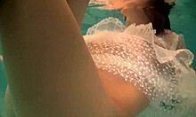 russian babe natalia strips in pool