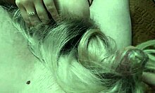 Long blonde hair gets masturbated with a dick and covered in cum.