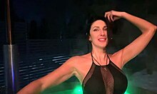 Perfect brunette takes an outdoor bath