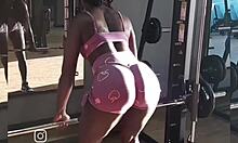 Black babe resists gym guys, gives ass and pussy.