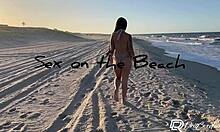 Hot brunette bends over for doggystyle fucking on the beach