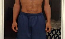 Mature Woman with Brown Eyes Works Out Barefoot in Dorm Gym