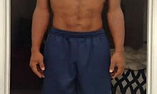 Mature Woman with Brown Eyes Works Out Barefoot in Dorm Gym