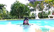 tobie teen masturbates by the pool, teasing with small tits