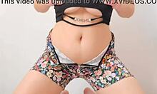 she undresses and fucks with her big tits in a cute solo scene